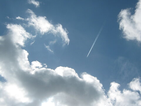 shooting star jet in blue sky