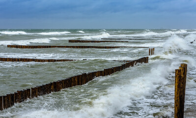 Sea coast. Tides and storms at sea. Waves on the Baltic Sea. Deserted seashore.