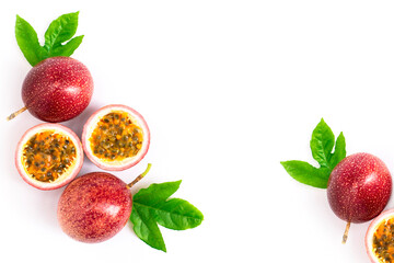 Closeup passionfruit ( maracuya ) or passion fruits and half slice with green leaves isolated on...