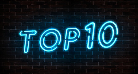 Top 10 neon light text on empty red brick wall banner. Bright neon sign of top ten list winners at...