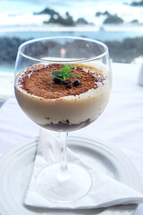 Tiramisu is a popular coffee-flavoured Italian dessert. It is made of ladyfingers dipped in coffee, layered with a whipped mixture of eggs, sugar, and mascarpone cheese, flavoured with cocoa
