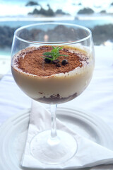Tiramisu is a popular coffee-flavoured Italian dessert. It is made of ladyfingers dipped in coffee, layered with a whipped mixture of eggs, sugar, and mascarpone cheese, flavoured with cocoa