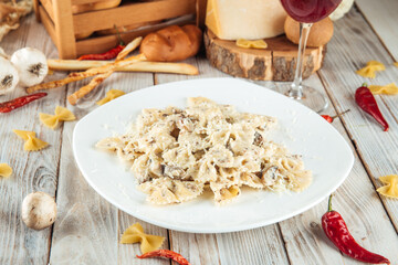 Farfalle pasta with mushrooms and creamy sauce