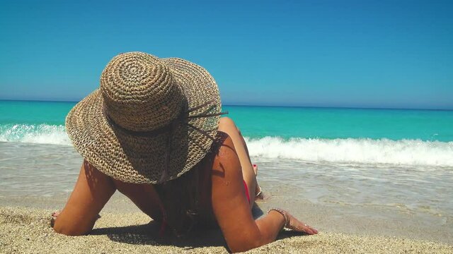 Woman enjoying the beach at Greek island r
