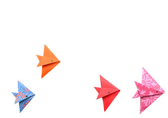 Colorful origami fishes in row