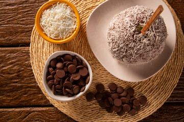 Candied apples on sticks with caramel, chocolate and coconut