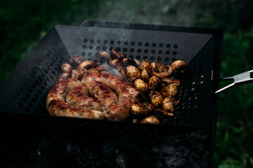Grilled chicken sausage with mushrooms in a pan