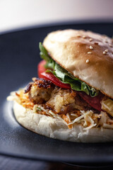 Healthy burger with meat, tomato and rucola