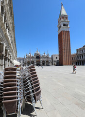 Bell tower of Saint Mark Square and the desert square  in Venice