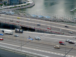 aerial view of highway road traffic on bridge and vehicle passing