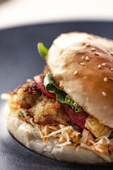 Healthy burger with meat, tomato and rucola
