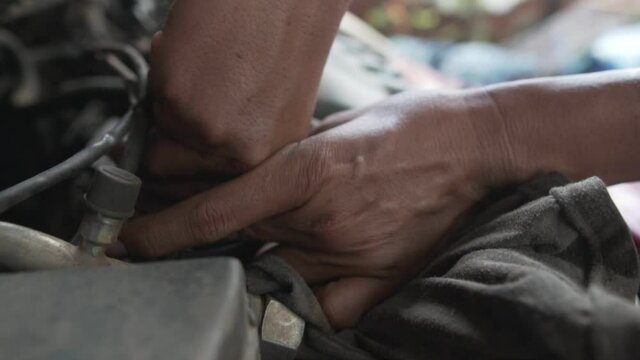 Footage Slow Motion: Automobile car oil replacement 