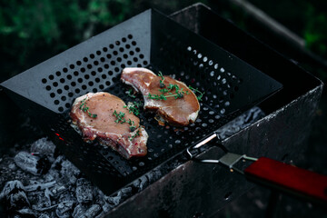 Pork bone steak cooked in a barbecue pan