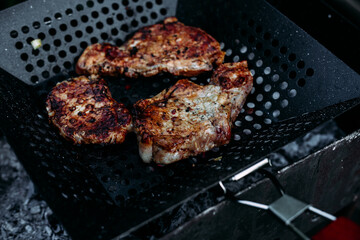 Pork bone steak cooked in a barbecue pan