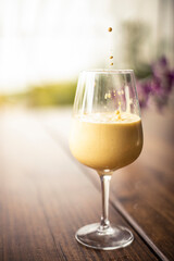 glass of ice turmeric latte