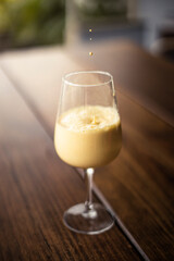 glass of ice turmeric latte