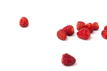 Macro view wild strawberry on white background. Forest red berries