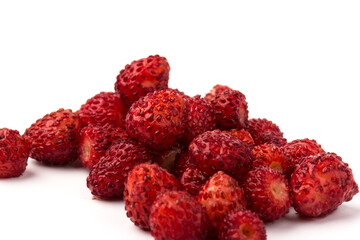 Macro view wild strawberry on white background. Forest red berries