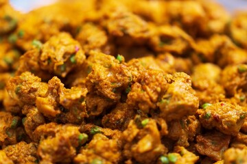 Close up of Deep Fried Fish Pasty Or Fish With Red Curry Pancake thai street food market