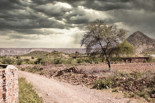 Rajasthan, India - October 06, 2012: A landscape surrounding abandoned cursed fort in a place named Ajabgarh on a way to allegedly haunted place Bhangarh fort