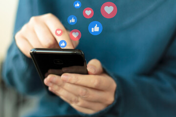 Woman using smartphone. Concept of social media and live stream