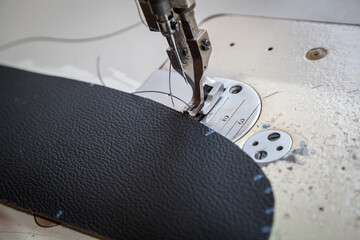 Tailoring of leather products. Repair of the car seat cover.