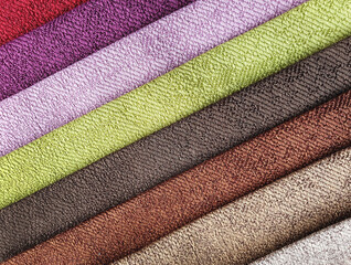 Closeup detail of multi color fabric texture samples. interior material for curtain or drapery.
