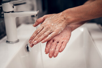 Coronavirus. Proper washing and handling of hands. Liquid antibacterial soap. Self-isolation and hygiene.