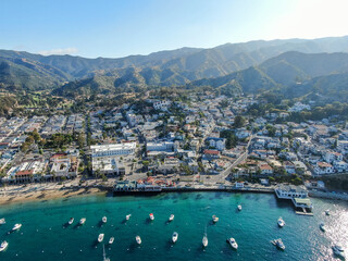 Fototapeta na wymiar Aerial view of Avalon downtown and bay with boats in Santa Catalina Island, famous tourist attraction in Southern California, USA