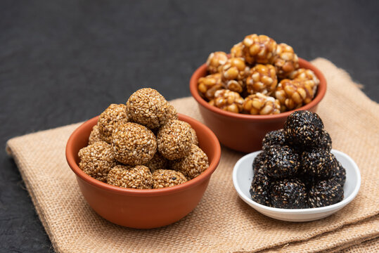 Sesame seeds balls - sweet made with sesame and palm sugar. Tilgul Laddu or Til Gul balls for makar sankranti, Roasted thala balls. Indian snacks