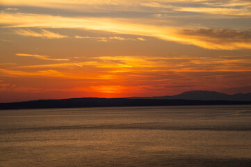 Fototapeta na wymiar Beautiful scene of sunset over the Ocean 