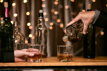 Celebrate whiskey on a friendly party in  restaurant