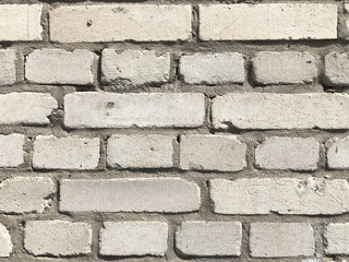 Old white brick wall, grunge texture.