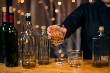 Whisky is poured into glass
