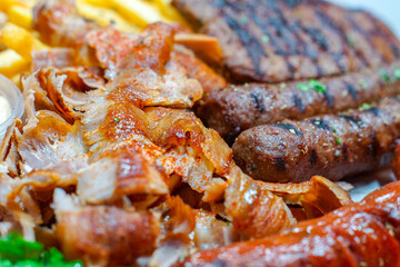 Greek / Arabic Restaurant Meat Platter, Lamb, Beef, Chicken, Pork Kebab Skewers Sauce Tahini Feta Fries Chips Sausages