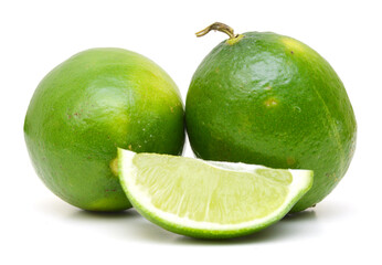 Fresh limes isolated on white