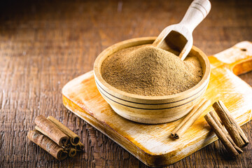 ground cinnamon and ground cinnamon, with a spot focus.