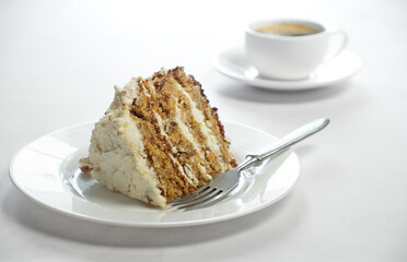 Delicious carrot cake with a cup of coffee, food photo.
