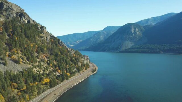 Bird´s Eye view of the Columbia River Highway in Oregon / Washington and of the home valley park in autumn with colorful yellow and orange trees - 4k