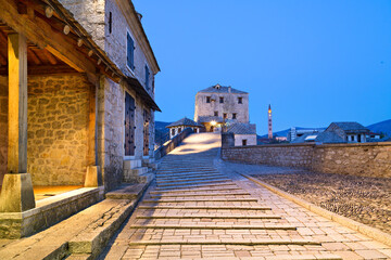 Historical buildings and cobblestone street, at dawn, in Mostar, Bosnia and Herzegovina