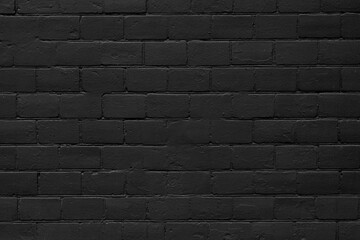 Black brick wall. Texture of black bricks for modern interior.