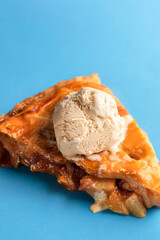 Apple pie slice with vanilla ice cream. American pie slice close-up