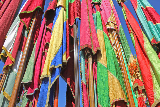A detail of the colorful flags called "pendones" used during the patron saint festivities of the towns of the province of Le&oacute;n, Spain