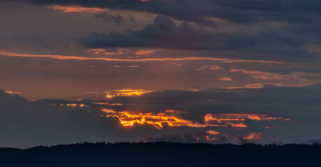 Sunset in hot summer rainy evening near Roprachtice village