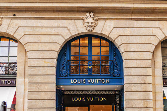 View of French luxury fashion house Louis Vuitton. Flagship store opened in heart of Place Vendome - a place where Louis Vuitton founded his first store in 1854. PARIS, FRANCE. June 11, 2018.