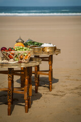 wedding ceremony on the ocean in Morocco, fruits and traditional sweets for treats