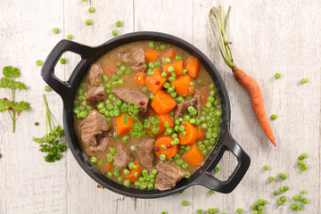 beef with carrot and pea in casserole