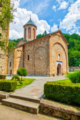 Fototapeta na wymiar Medieval Raca Monastery. Serbian Orthodox monastery built in the 13th century as the endowment of Serbian King Stefan Dragutin Nemanjic. Located south of Bajina Basta, Serbia.