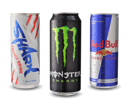 Photo of Shark, Red Bull and Monster energy drink cans isolated on white background