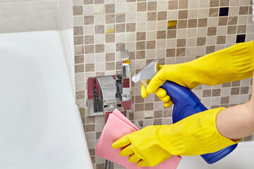 Apply household chemicals, detergent to a silver bidet shower, or health faucet.